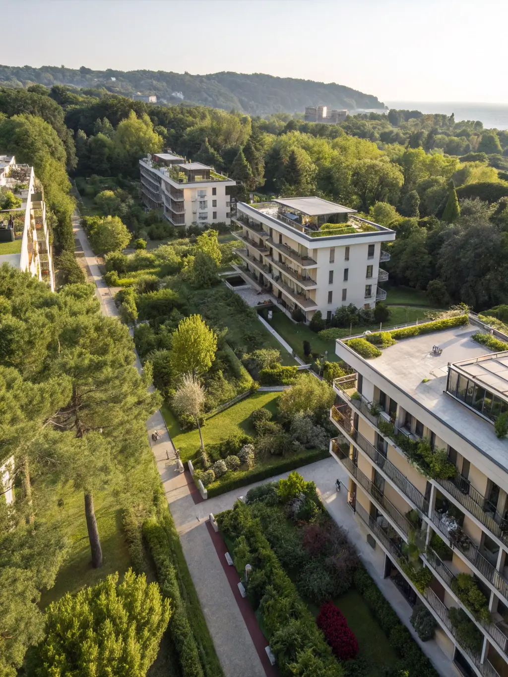 A luxury residential complex with well-manicured lawns, showcasing high-value real estate properties.